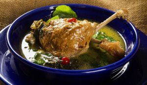 Savory Pato no Tucupi, a delectable duck stew cooked in a tangy sauce made from tucupi, a flavorful cassava broth. 